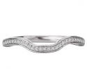 This is a stunning curved matching wedding band with round diamonds set in 18kt white gold. 