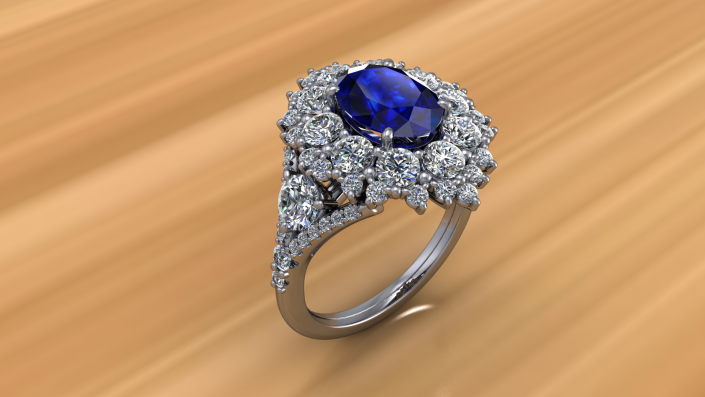 This is a stunning custom made ring.  As the center sapphire stone sparkles diamonds encompass it to highlight this beautiful stone. 