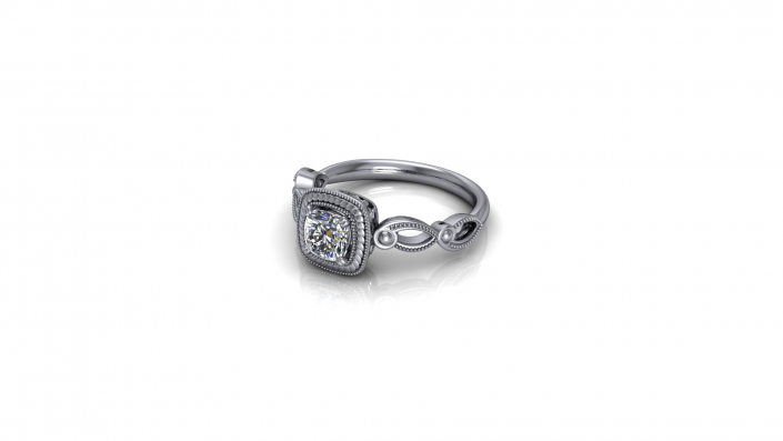 This classy ring displays one's love for another as it sparkles in the sunlight.  The band looping to add beautiful detailing to a cushion set diamond. 