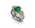 Not all engagement pieces have to be diamonds.  This beautiful piece displays a gorgeous emerald stone with twin diamonds alongside it.  This ring shows beautiful contrast throughout and is surely a unique design that will be cherished for years to come. 