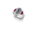 This elegant ring displays an oval cut diamond alongside two sparkling rubies.  A ring fit for a princess this custom engagement ring is the perfect display of love. 