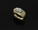 This is a custom designed gold ring that features three stunning diamonds. 