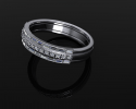 This stunning white gold ring with three layers of diamond embellishments crafted to have a "stacked" ring look. 