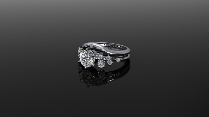 This is a beautiful sterling silver ring that displays an array of twinkling diamonds.  As the complementing stones build on one another they create a highlight for the beautiful center stone. 