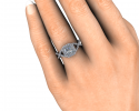 This is a display of how this custom ring will look on its beautiful bride to be's finger. 