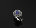 This beautiful sapphire ring creates the perfect engagement piece.  Encompassed in a sparkling double halo of diamonds sits a cushion-shaped sapphire.  Allow us to create you a unique piece such as this one at J Olivers. 